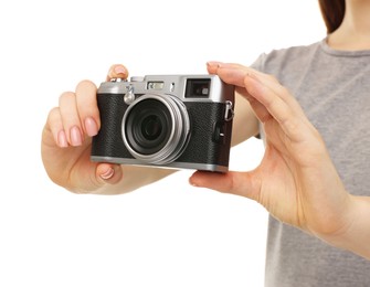 Photo of Photographer with camera on white background, closeup