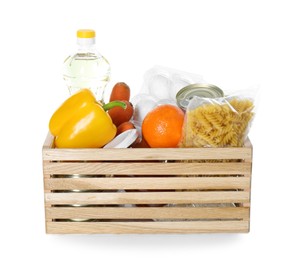 Photo of Wooden crate with donation food isolated on white