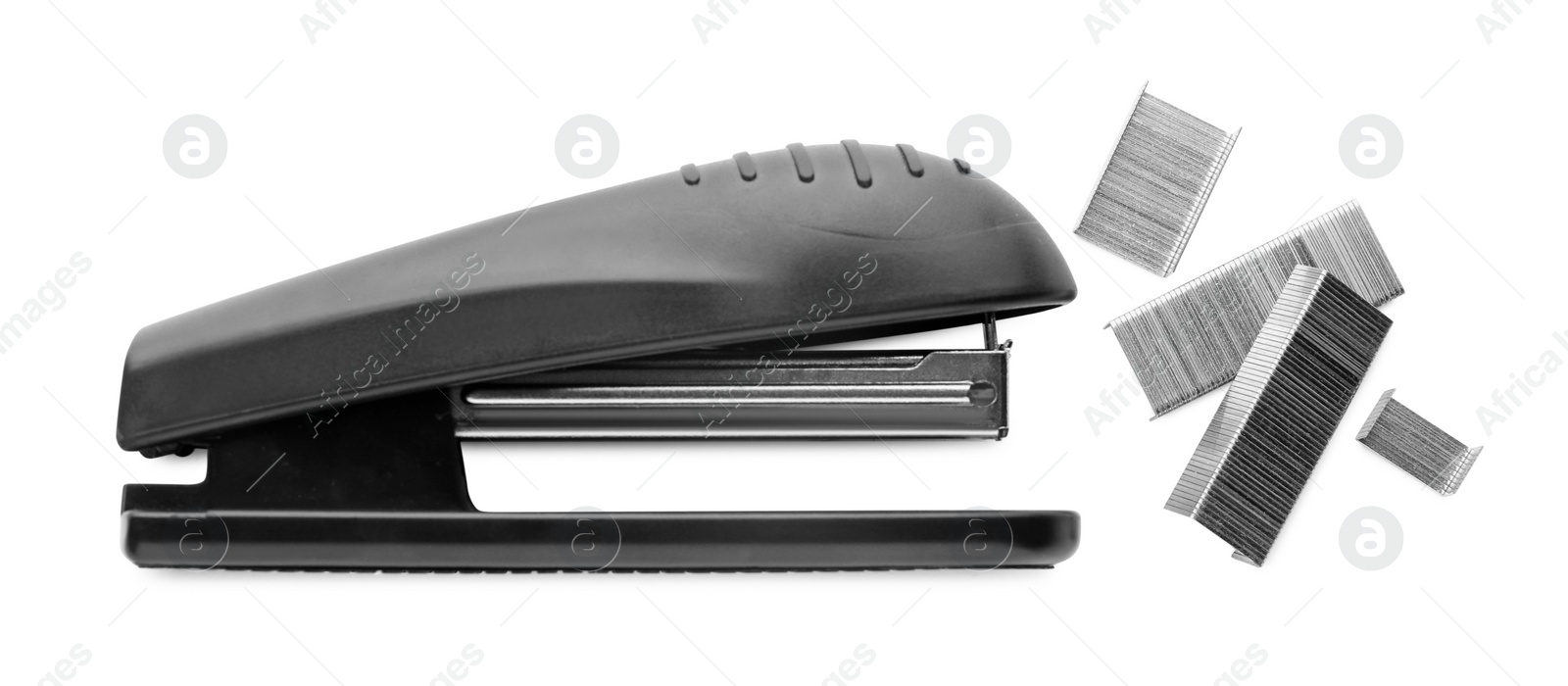 Photo of New black stapler with staples isolated on white, top view