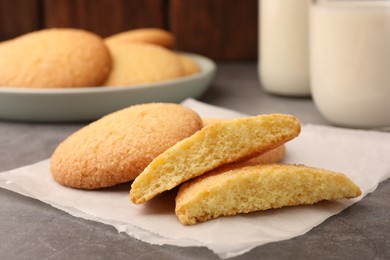 Photo of Delicious Danish butter cookies on grey table, closeup