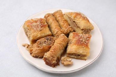 Eastern sweets. Pieces of tasty baklava on white table