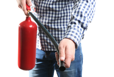 Man using fire extinguisher on white background, closeup