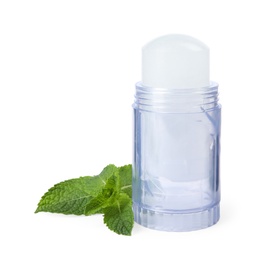 Photo of Natural crystal alum deodorant and mint on white background