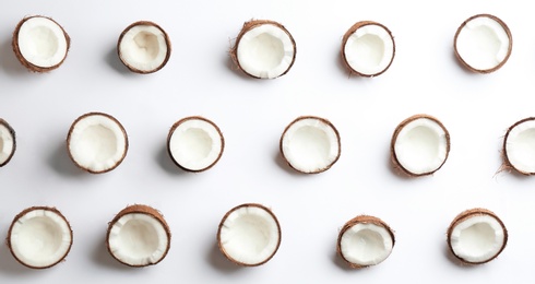 Photo of Coconut pattern on white background, top view