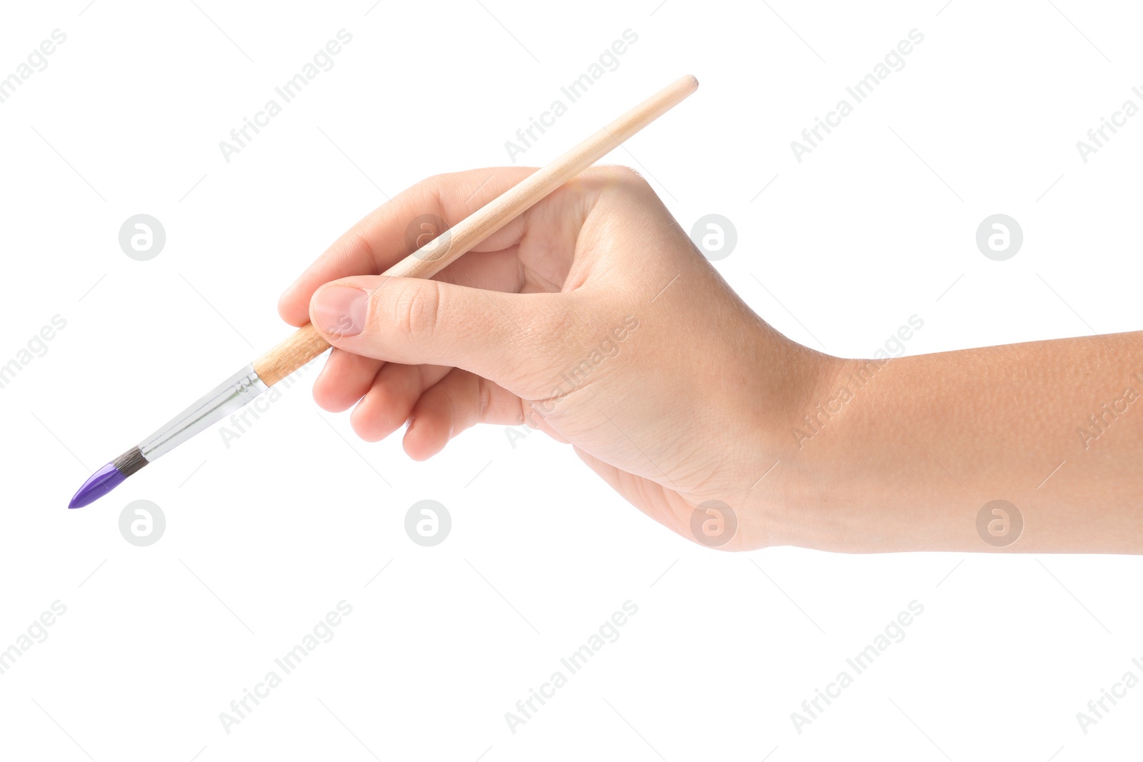Photo of Young woman holding brush with color paint on white background, closeup