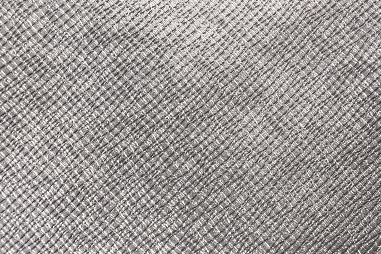 Photo of Closeup view of silver fabric as background