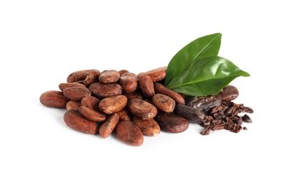 Pile of aromatic cocoa beans with leaves isolated on white