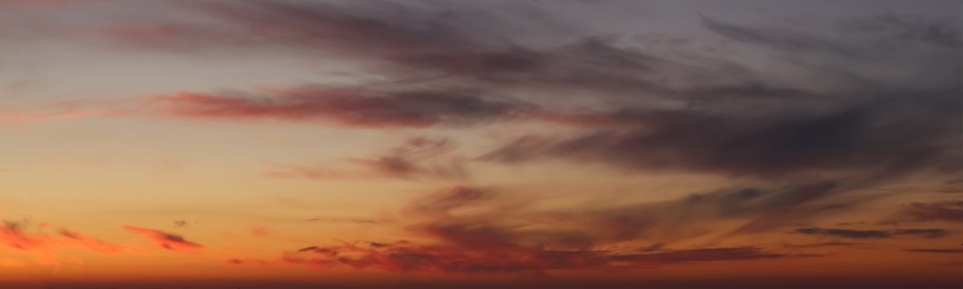 Image of Beautiful cloudy sky at sunset, banner design