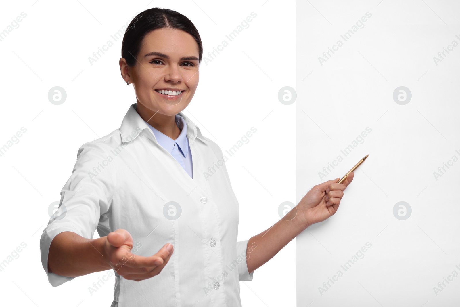 Photo of Ophthalmologist pointing at blank banner on white background, space for text