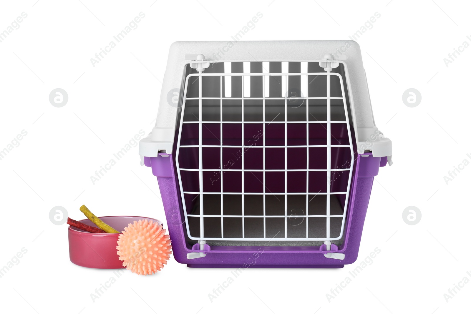 Photo of Violet pet carrier, bowl with treat and toy isolated on white