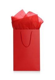 Photo of Gift bag with paper on white background
