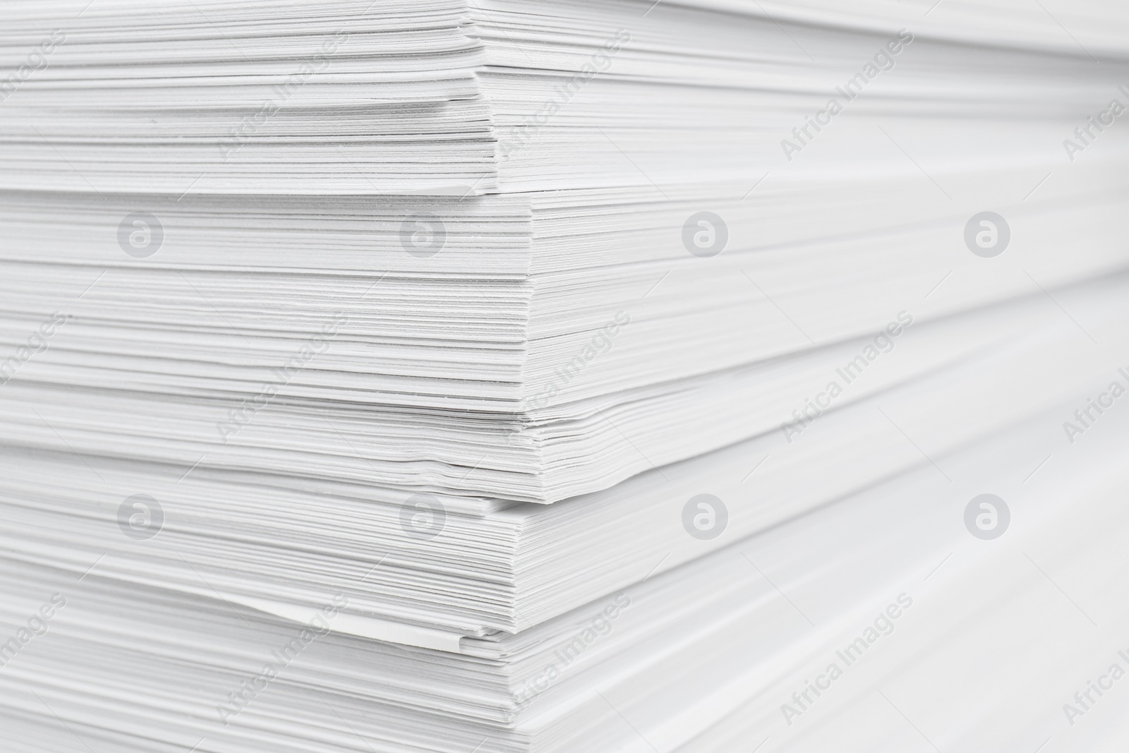 Photo of Stack of white paper sheets, closeup view