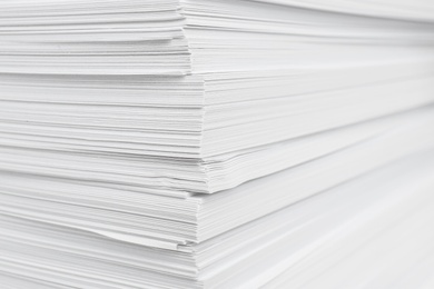 Photo of Stack of white paper sheets, closeup view