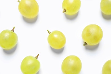 Photo of Fresh ripe juicy grapes on white background, top view