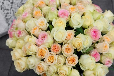 Photo of Bouquet of different beautiful roses, closeup view