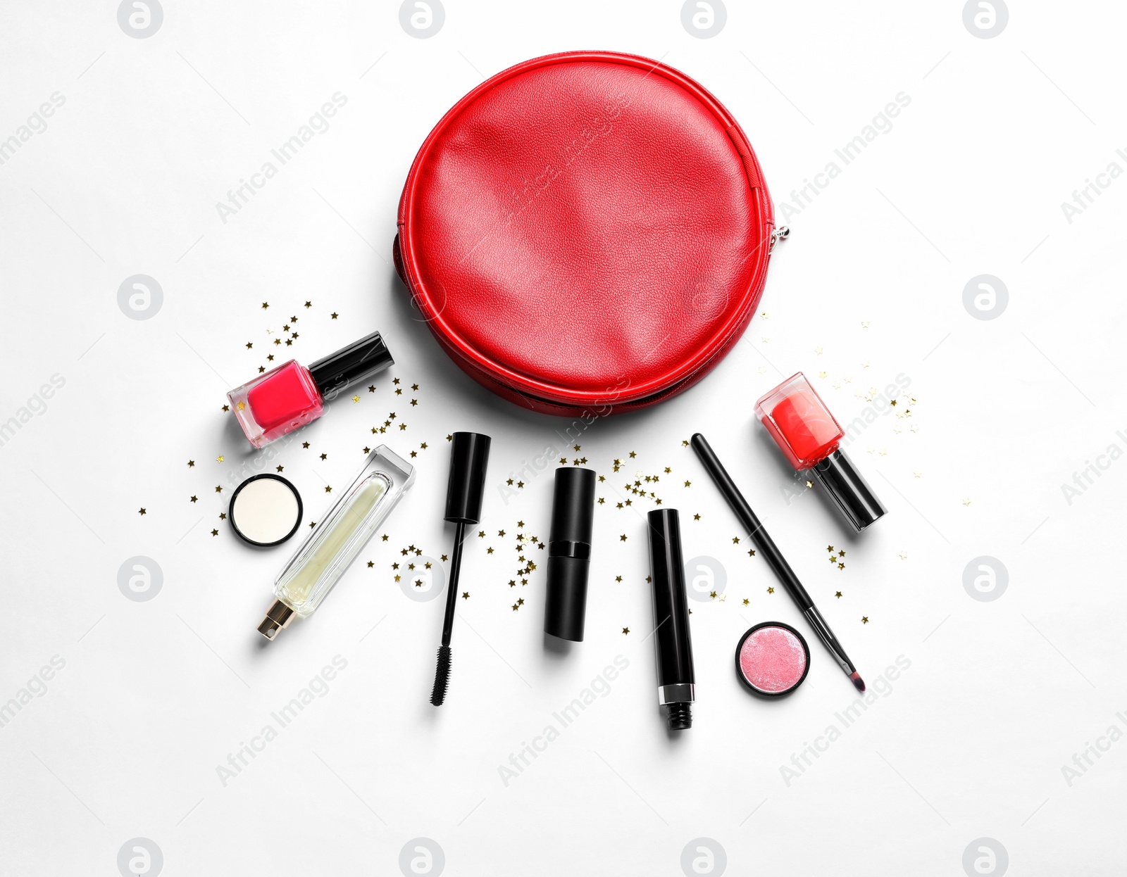 Photo of Makeup products with cosmetic bag on white background