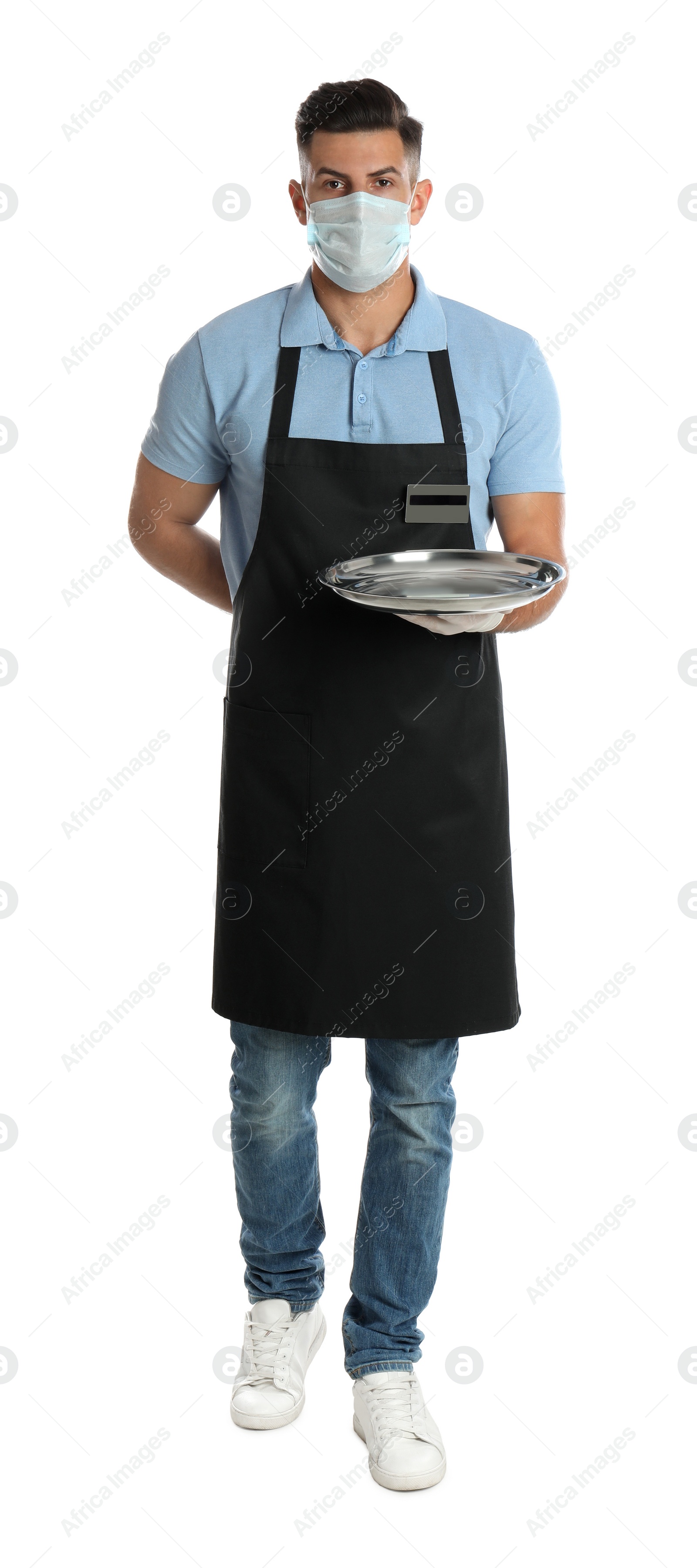 Photo of Waiter in medical face mask holding tray on white background