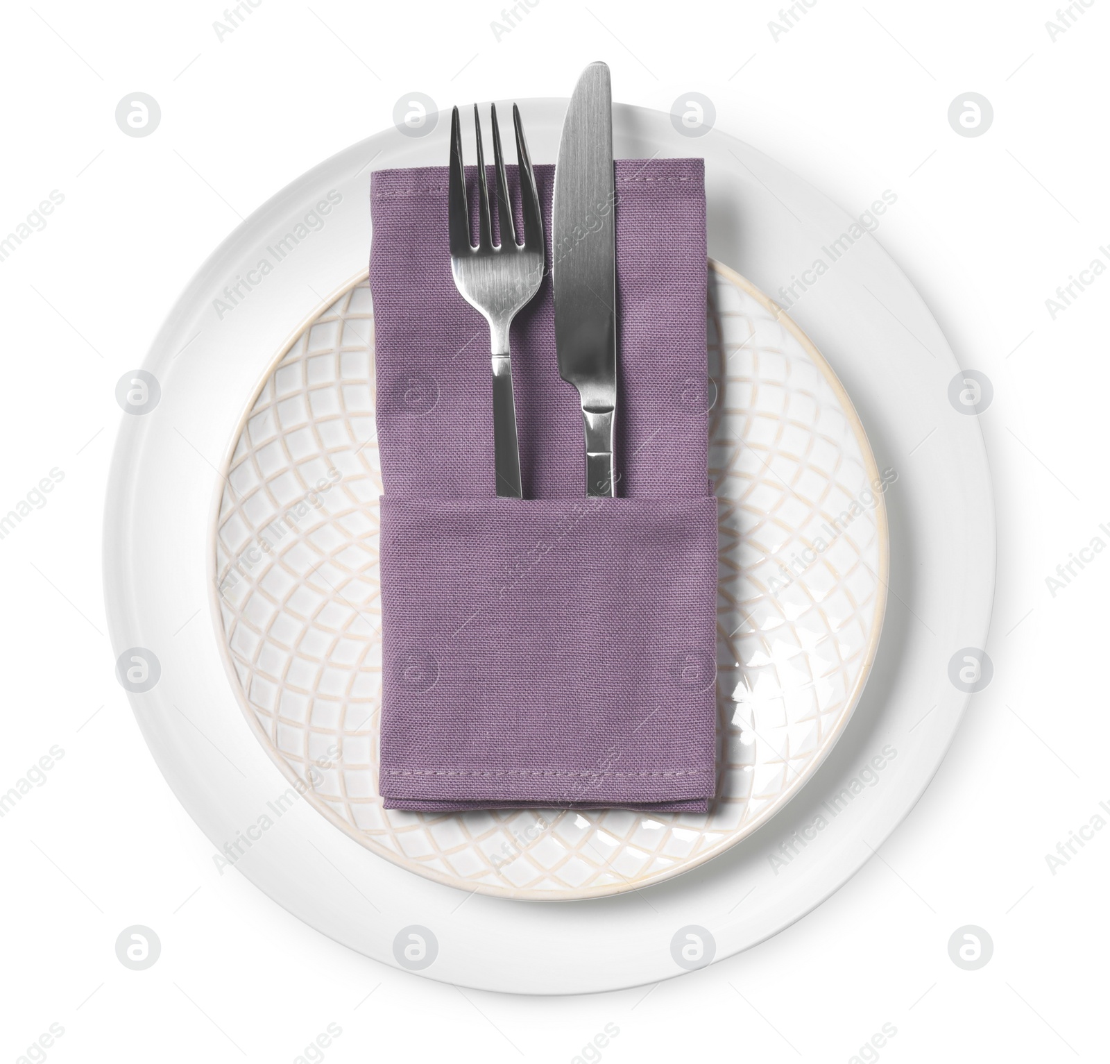 Photo of Plates with cutlery and napkin on white background, top view. Table setting