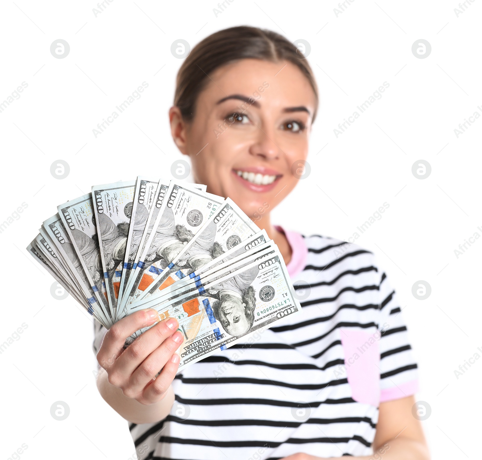 Photo of Portrait of young woman holding money banknotes on white background