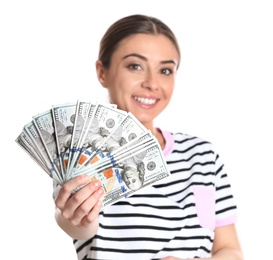 Portrait of young woman holding money banknotes on white background