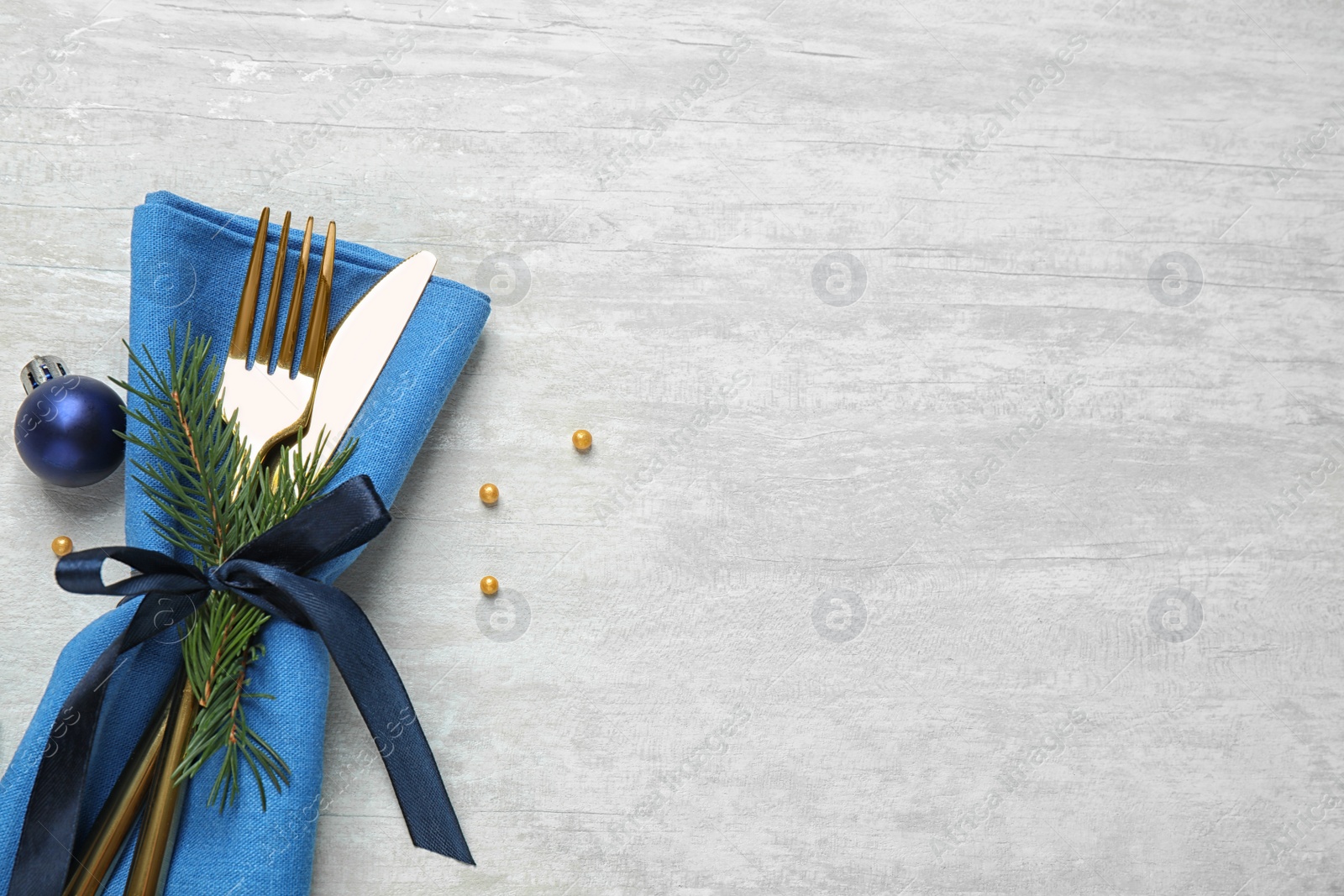 Photo of Cutlery set on white table, flat lay. Space for text