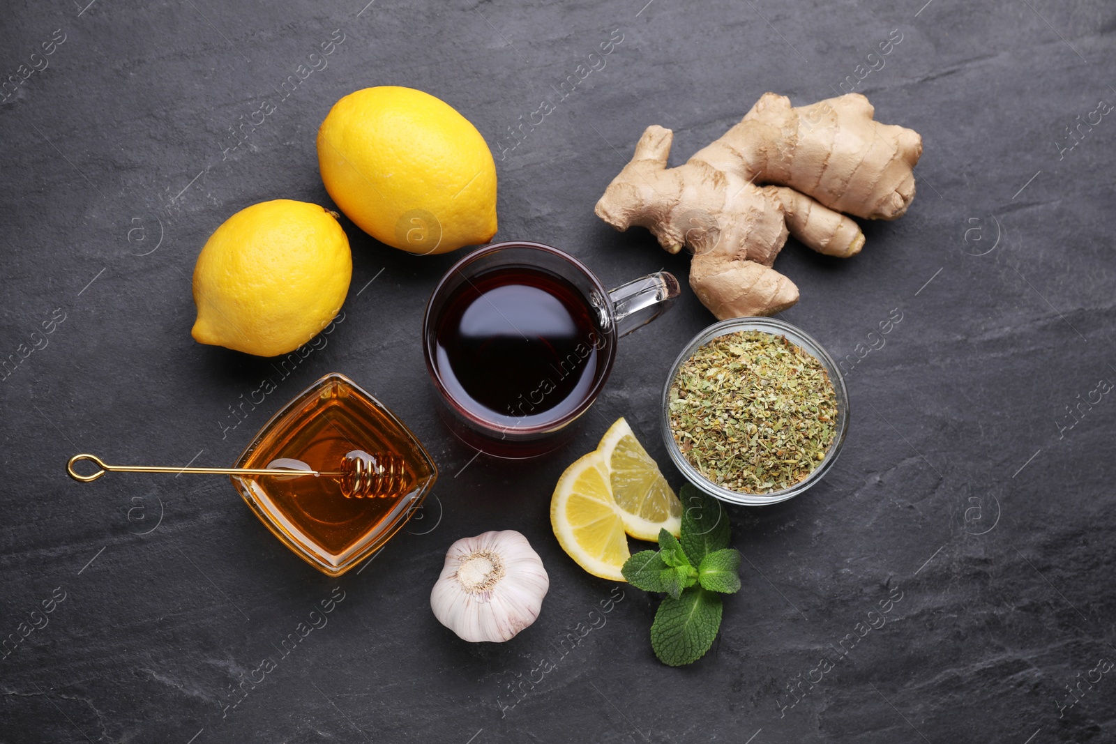 Photo of Cold remedies on black table, flat lay. Cough treatment