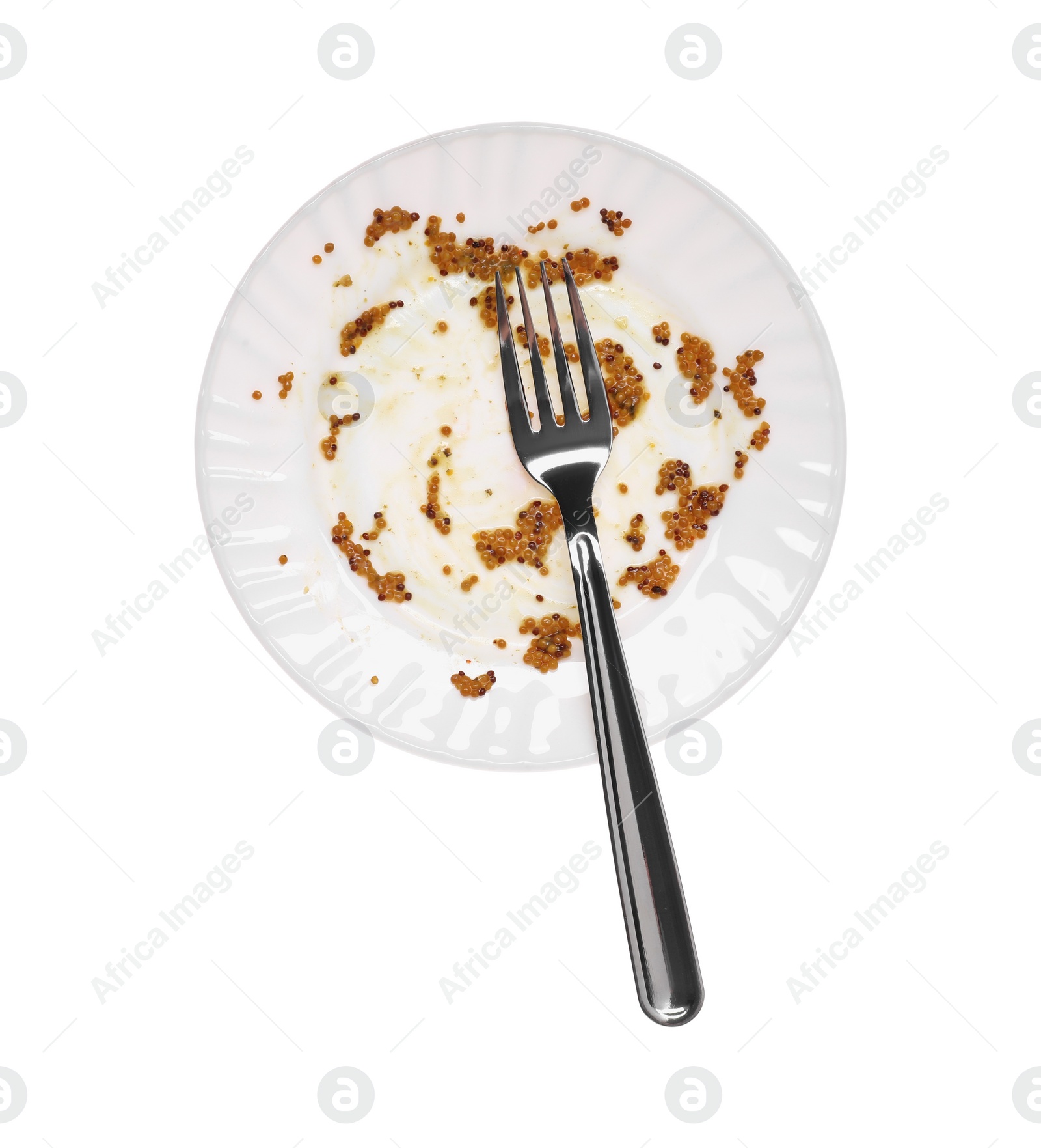 Photo of Dirty plate and fork on white background, top view