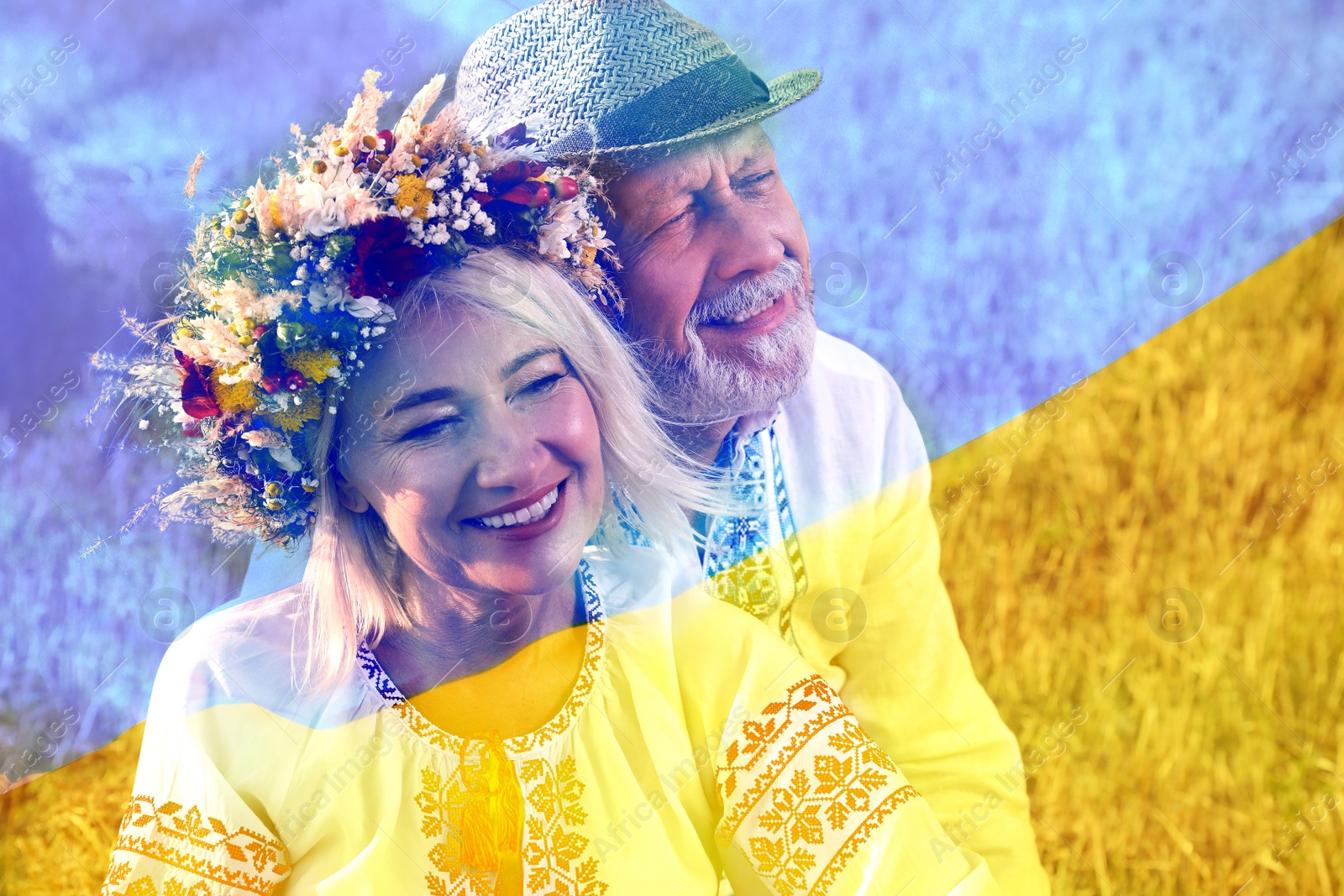 Image of Double exposure of happy mature couple wearing national clothes in field and Ukrainian flag