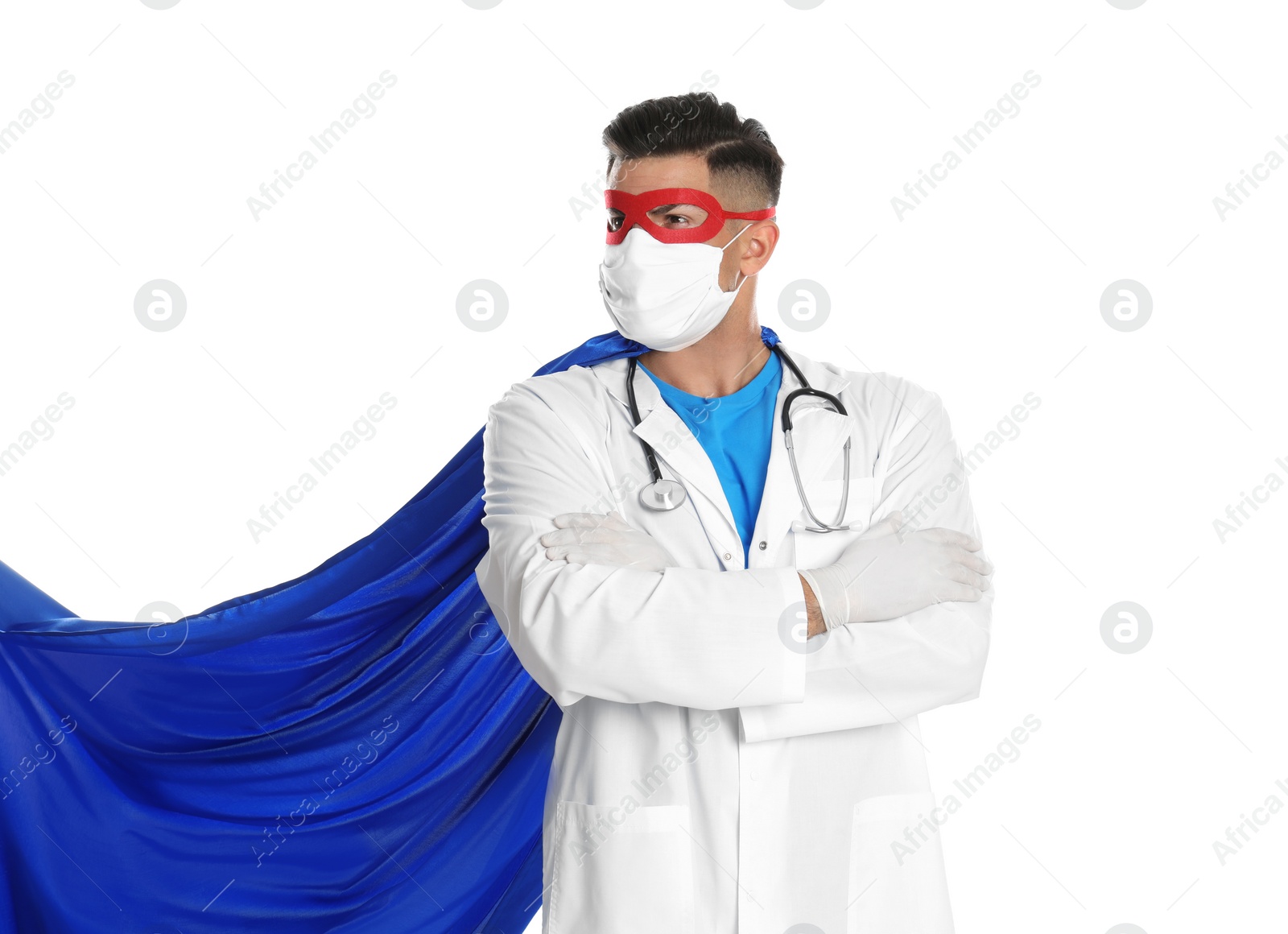 Photo of Doctor wearing face mask and cape on white background. Super hero power for medicine