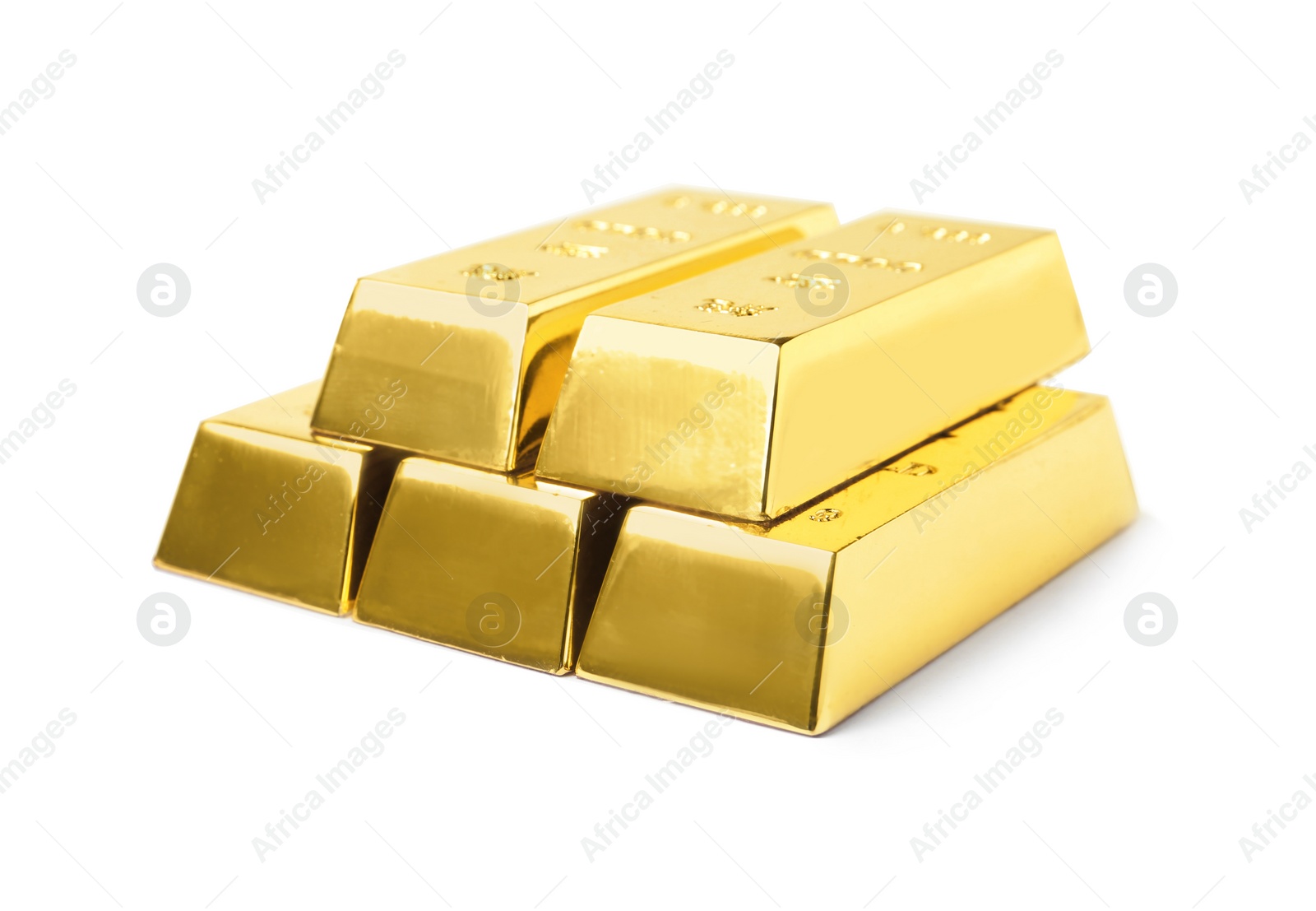 Photo of Stack of shining gold bars isolated on white