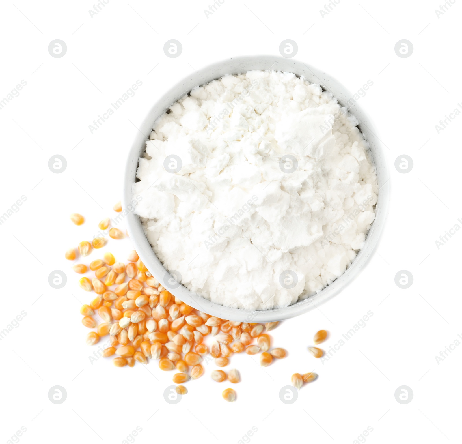 Photo of Bowl with corn starch and kernels on white background, top view