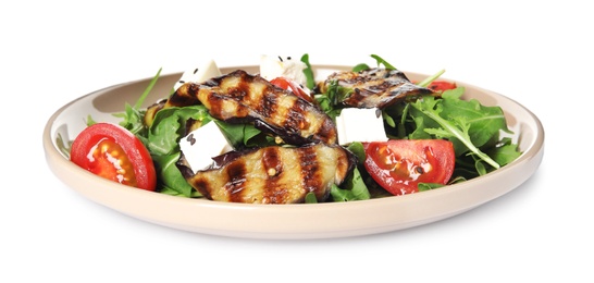 Photo of Delicious salad with roasted eggplant, feta cheese and arugula isolated on white