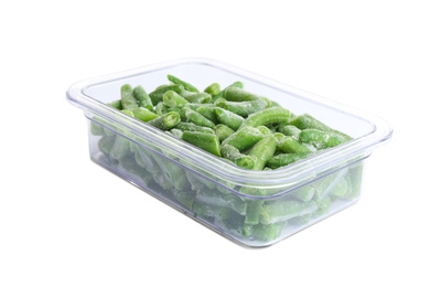 Photo of Frozen green beans in plastic container isolated on white. Vegetable preservation
