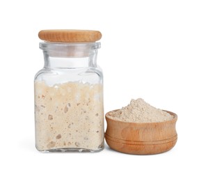 Photo of Fresh leaven in glass jar and wooden bowl isolated on white