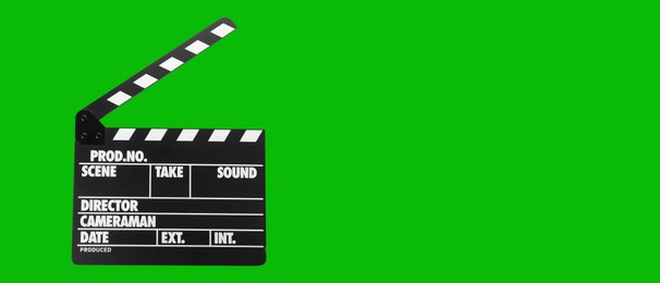 Clapper board on chroma key background, space for text. Banner design
