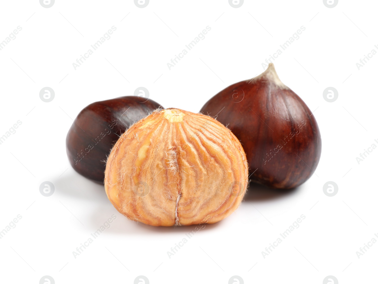 Photo of Fresh sweet edible chestnuts on white background