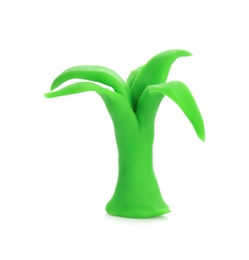 Photo of Small tree made from play dough on white background