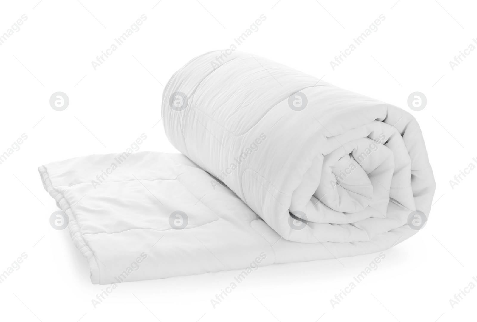 Photo of Rolled clean blanket isolated on white. Household textile