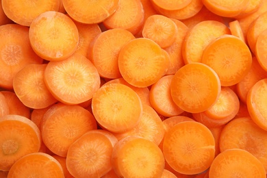 Photo of Sliced ripe carrot as background