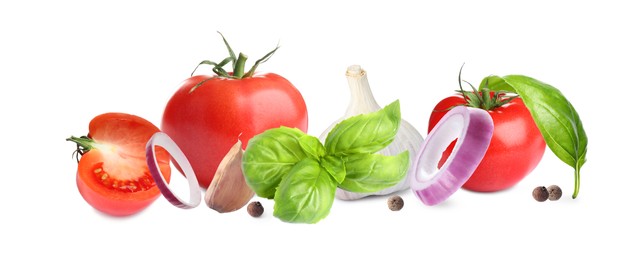 Image of Fresh ripe tomatoes with garlic, onion, basil, arugula and peppercorns on white background. Banner design