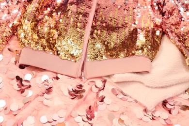 Stylish pink carnival costume with sequins, closeup