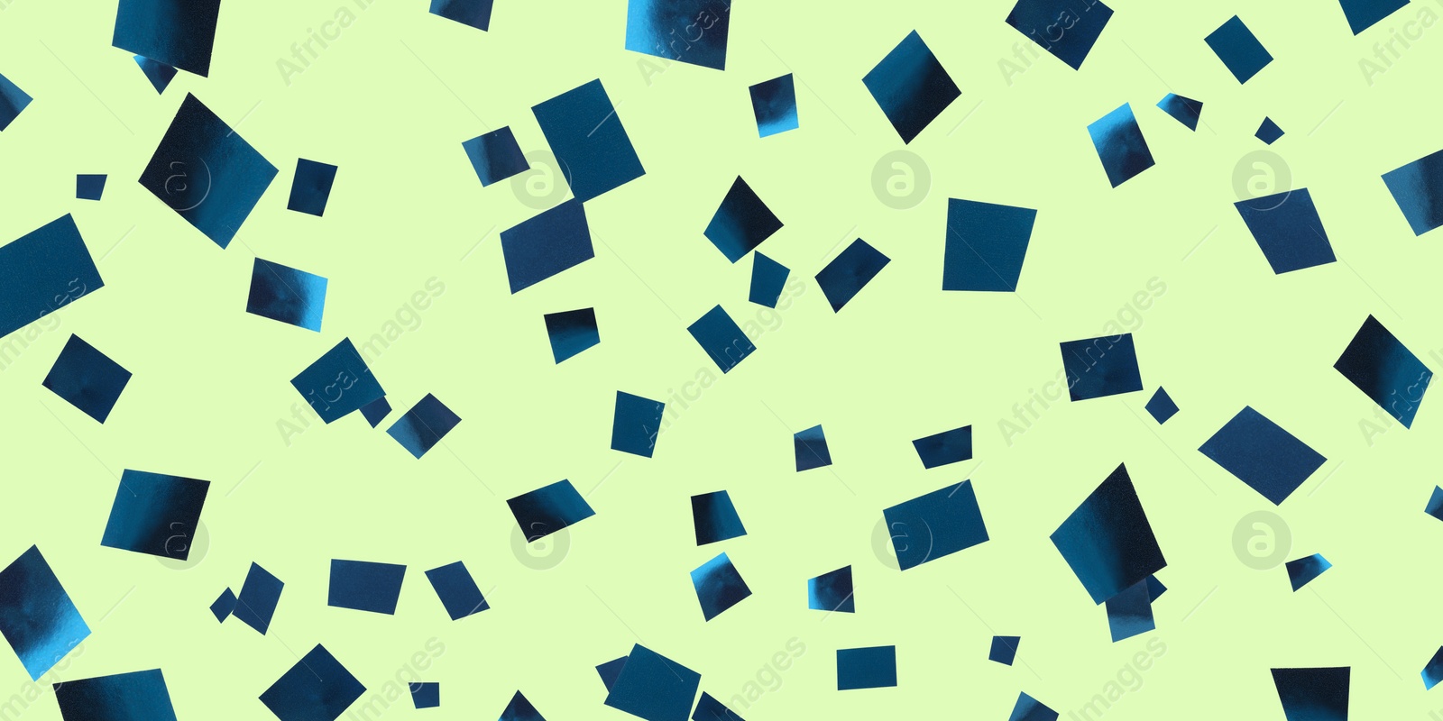 Image of Shiny blue confetti falling on light green background. Banner design