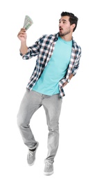 Photo of Handsome young man with dollars on white background