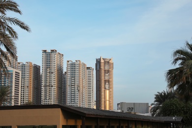 AJMAN, UNITED ARAB EMIRATES - NOVEMBER 04, 2018: Landscape with modern multi-storey buildings