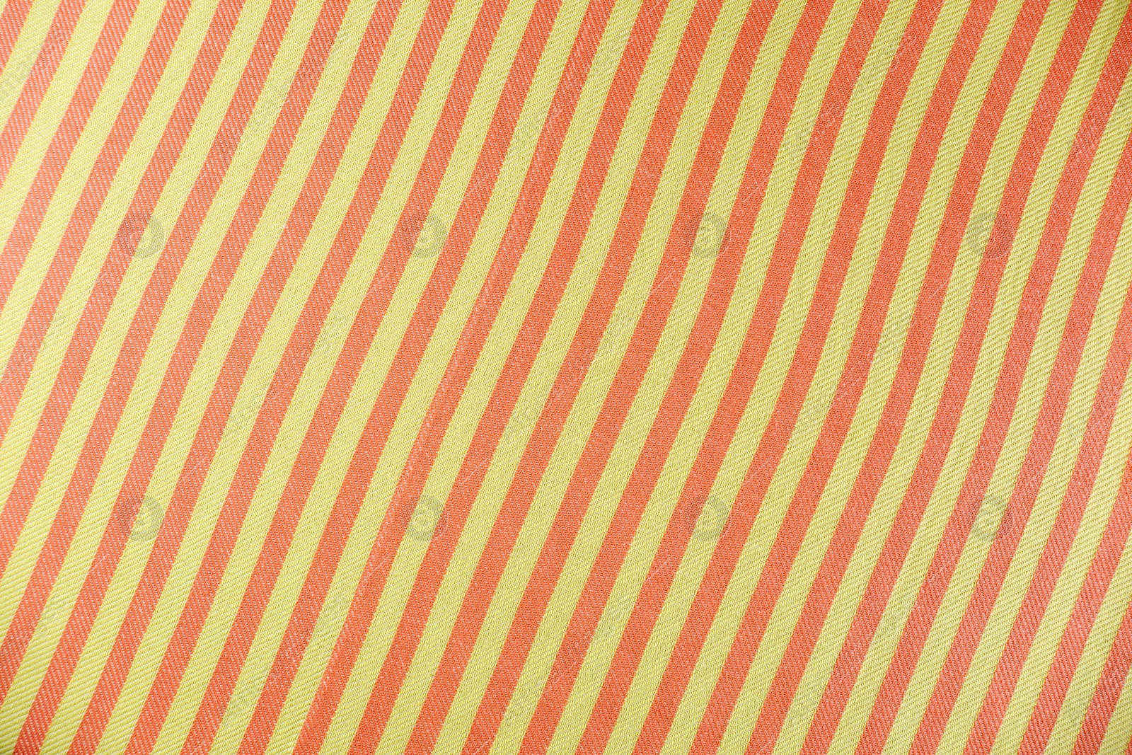 Photo of Striped beach towel as background, top view