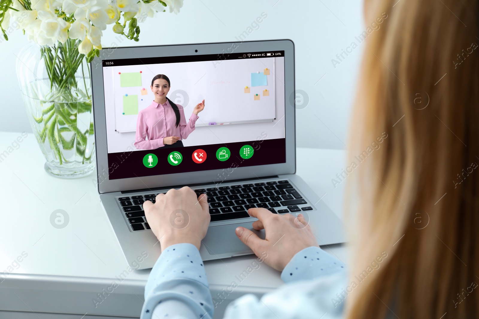 Image of Woman having online video consultation with business trainer at table, closeup