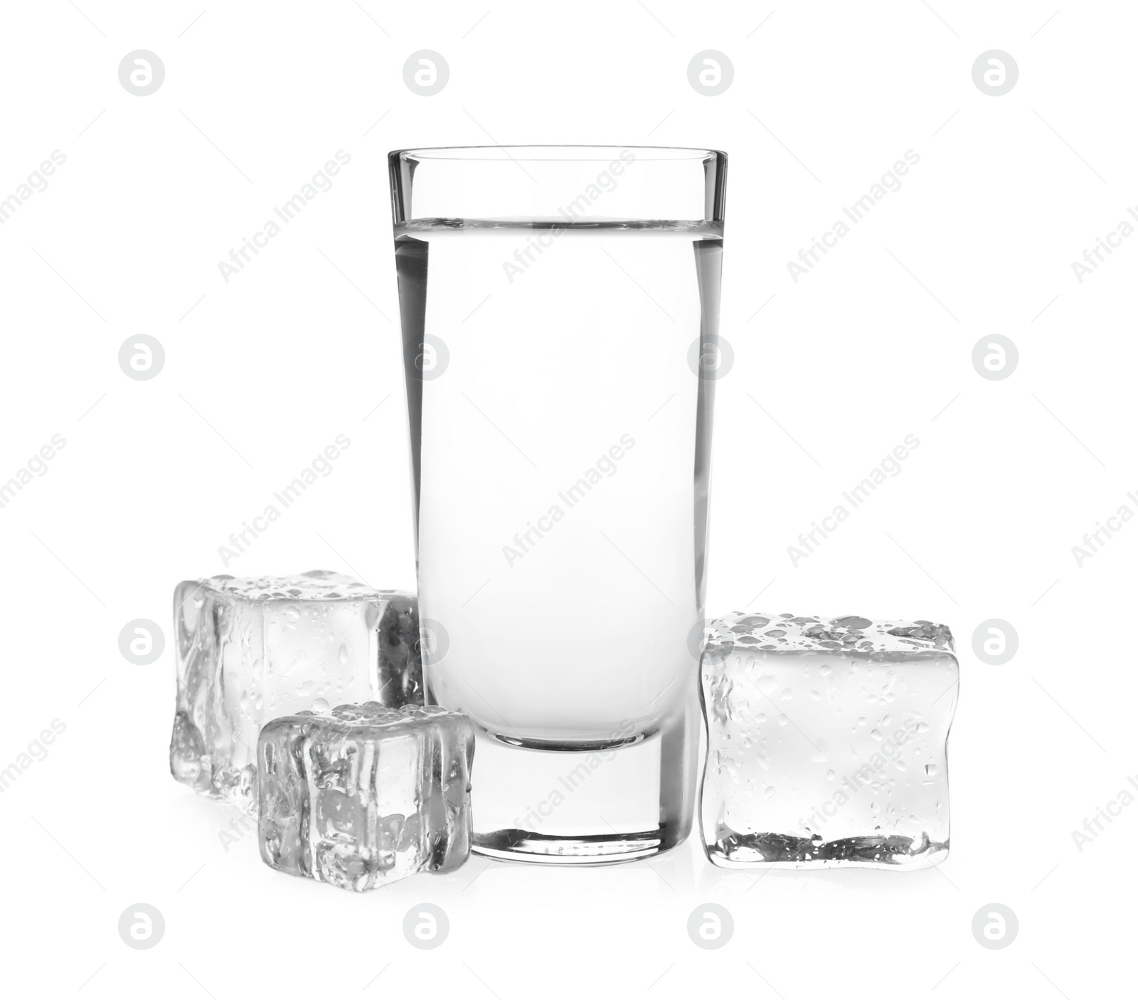 Photo of Vodka in shot glass and ice cubes on white background