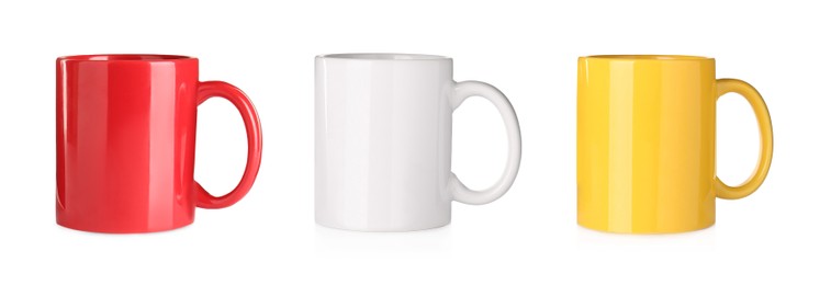 Set with different ceramic mugs on white background. Banner design