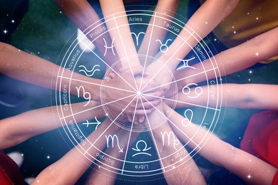 Image of Relationships and horoscope. Zodiac wheel and photo of people joining hands together, closeup