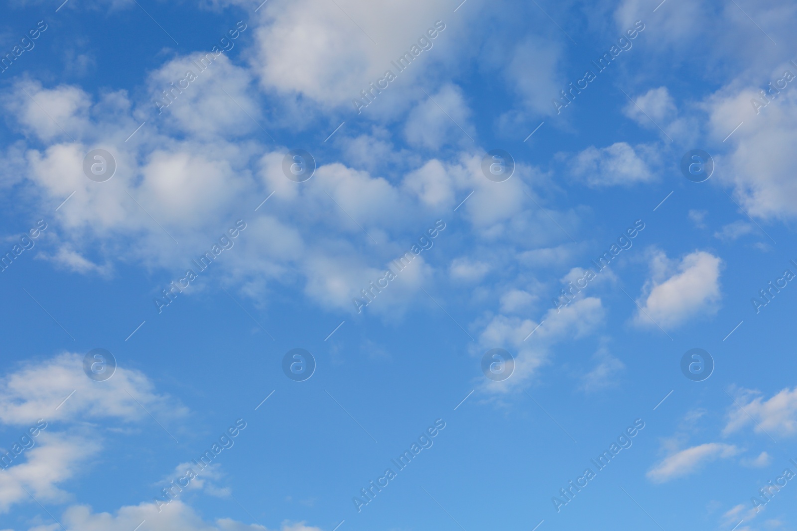 Photo of Picturesque view of beautiful fluffy clouds in light blue sky